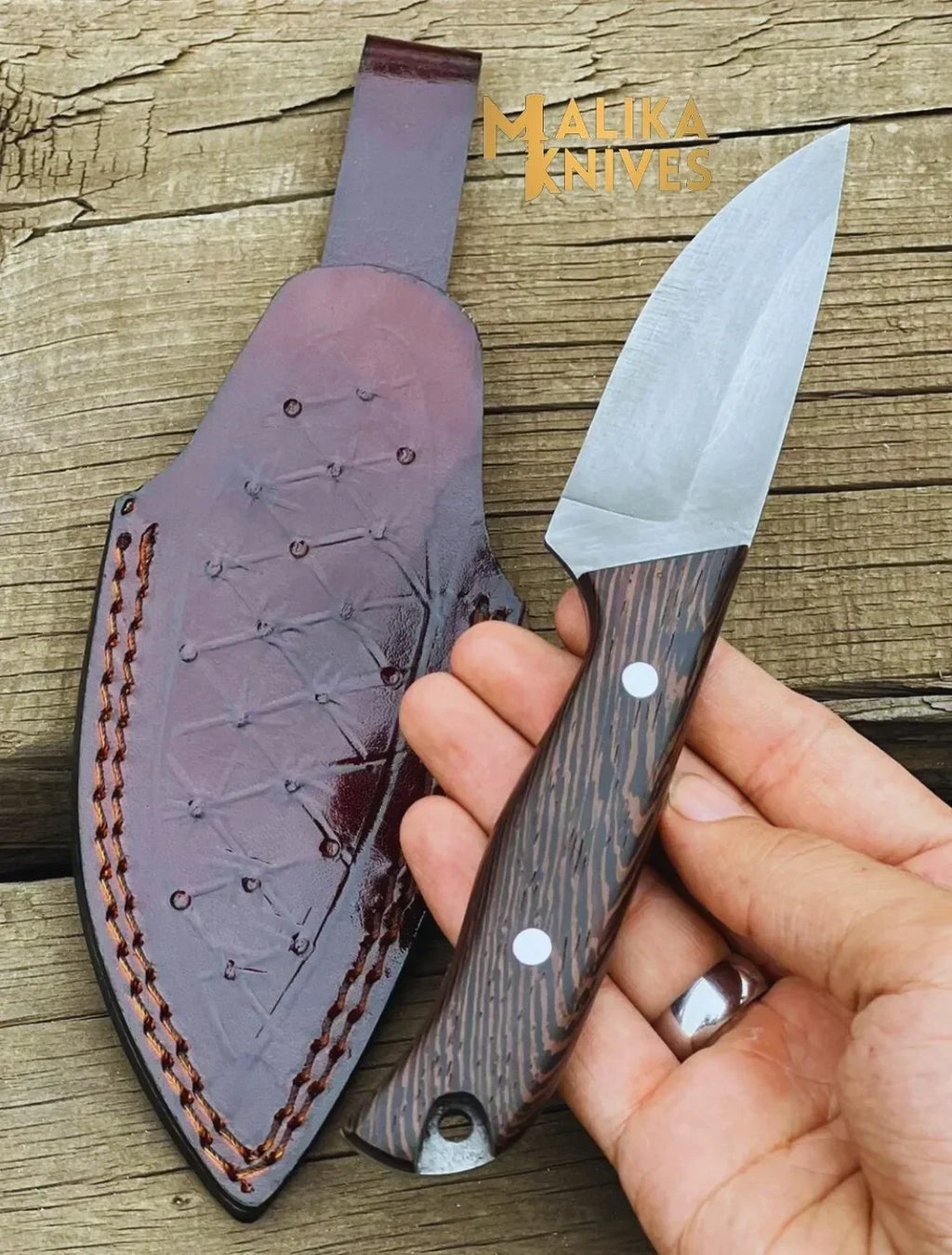 Handmade straight edge skinning knife with Wenge wood handle by MALIKA KNIVES, featuring a sleek simple design.