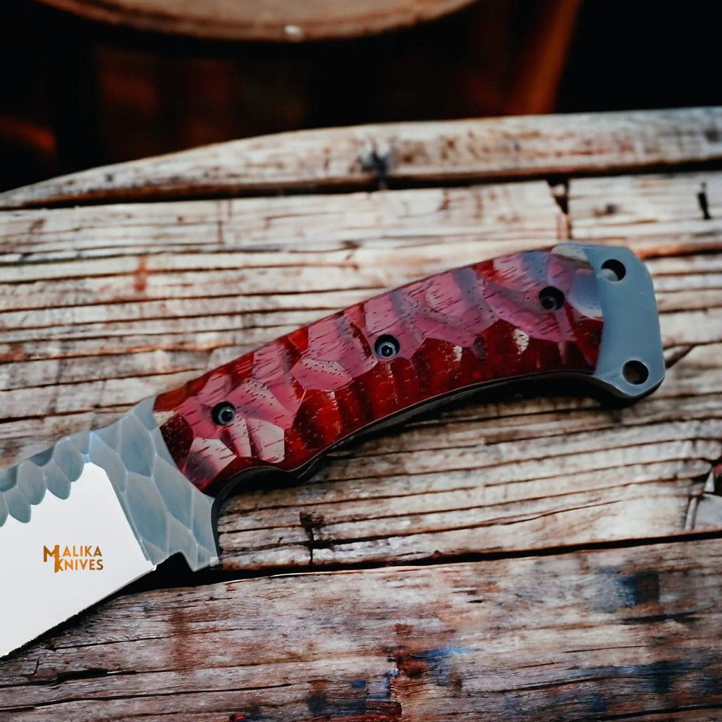 Handforged D2 Bowie knife with an 8-inch blade and G10 handle by MALIKA KNIVES, shown with a close-up of the blade and handle details.