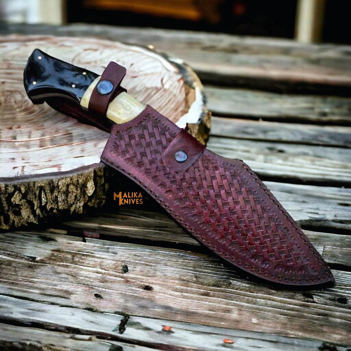 Malika Knives D2 Steel Bowie Knife with camel bone and bull horn handle, showcasing a sleek blade and natural handle materials.