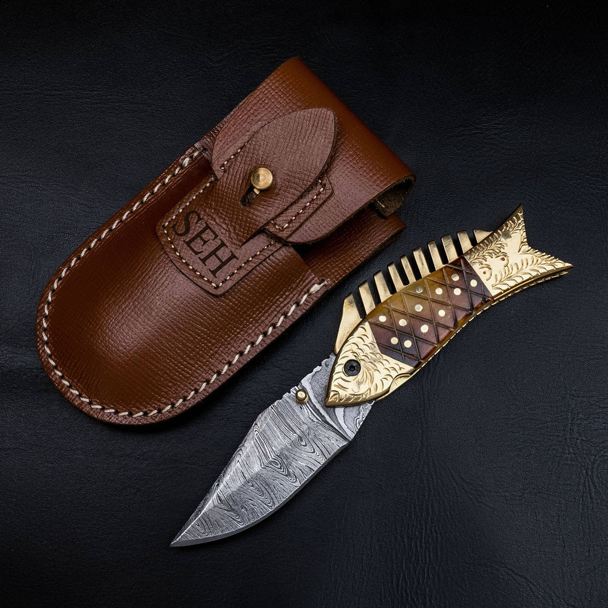 Damascus steel folding pocket knife with a 7-inch blade from cskforged, featuring a sleek, intricate pattern on the blade.