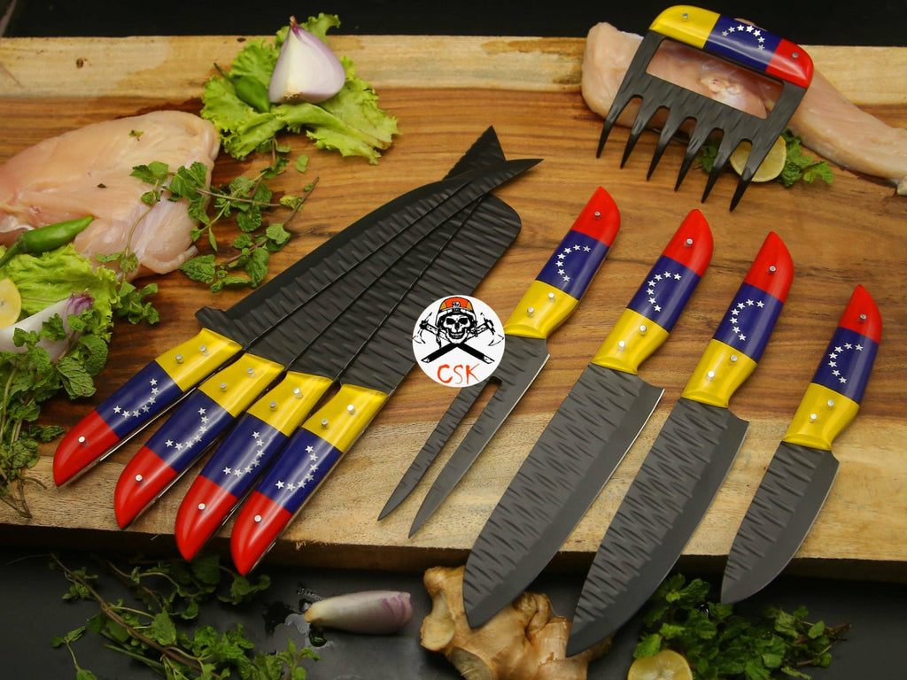 Black stainless steel chef knife by cskforged with a sleek handle and sharp blade, designed for precise kitchen cutting tasks.