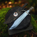 SS Damascus stag hunting knife by cskforged with custom leather sheath, featuring a detailed Damascus steel blade and stag handle.