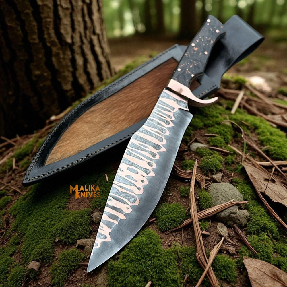 Copper Damascus Bowie knife with carbon fiber handle by MALIKA KNIVES, showcasing intricate blade pattern and sleek handle design.