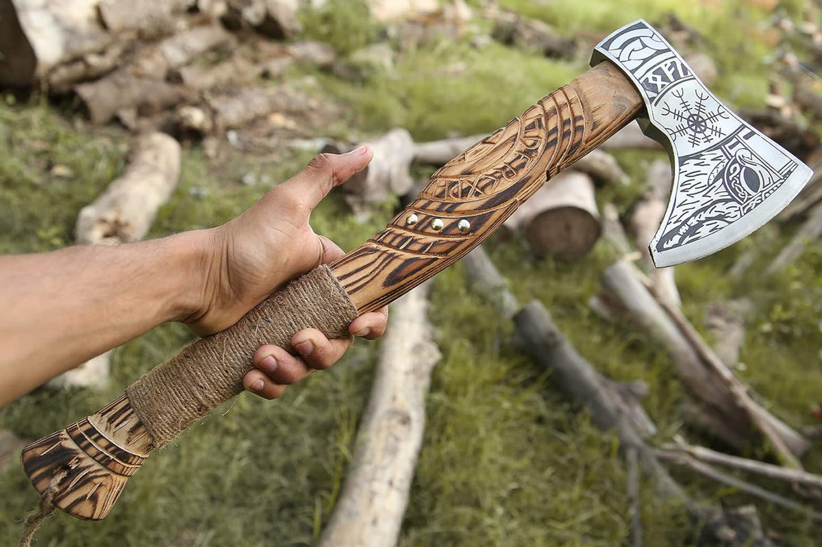 Handmade Viking axe hatchet with a forged steel blade and wooden handle, ideal for splitting and outdoor use.