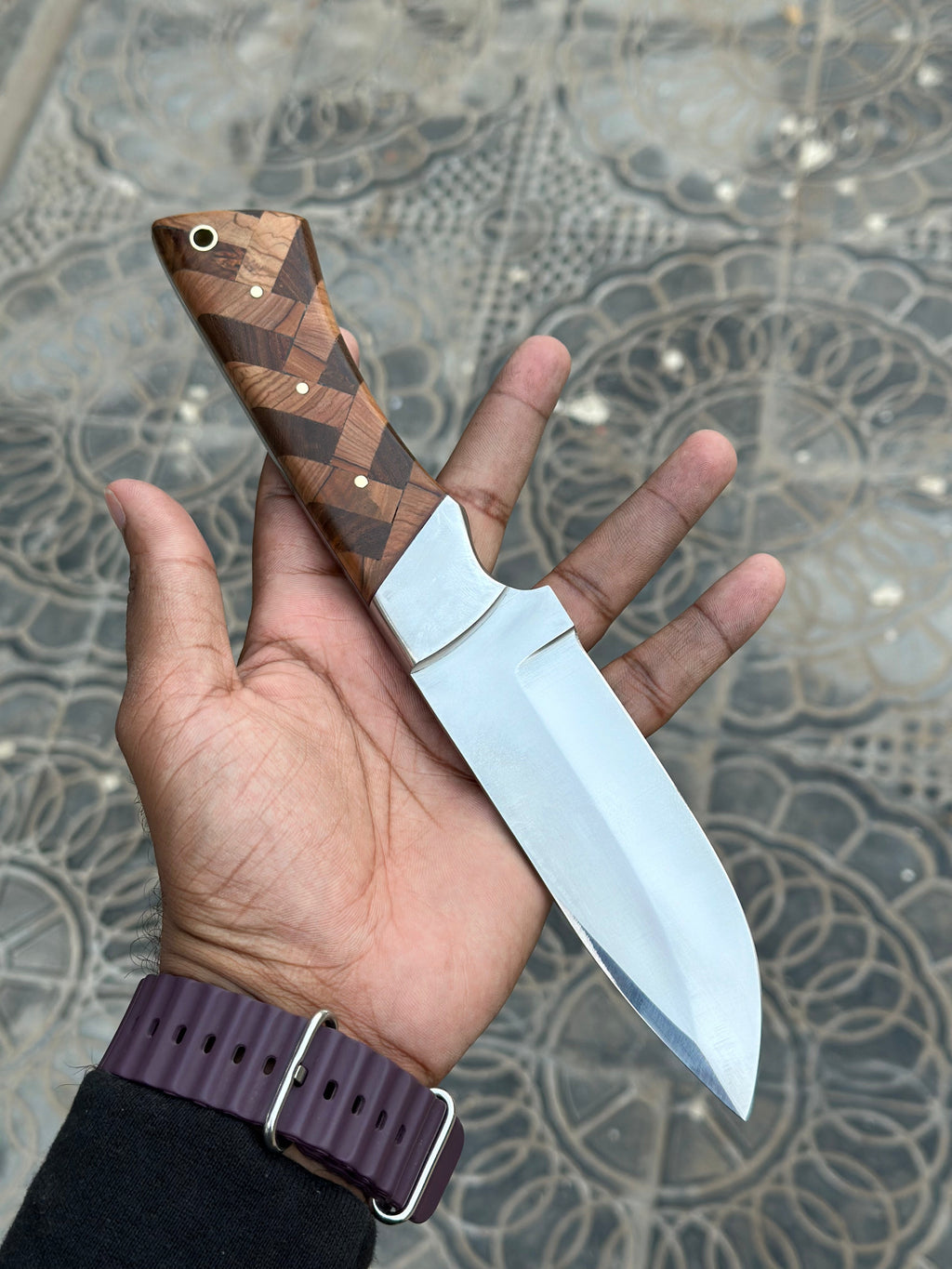 D2 hunting knife with black handle and sharp blade from Knives Gear Garage, ideal for outdoor and hunting use.