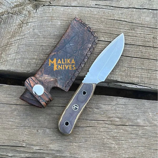 Close-up of a handcrafted MALIKA KNIVES EDC pocket knife with a sleek blade and durable handle, perfect for everyday use.
