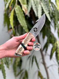 Handcrafted carbon steel hunting knife with antler handle by cskforged, designed for bushcraft and survival tasks.