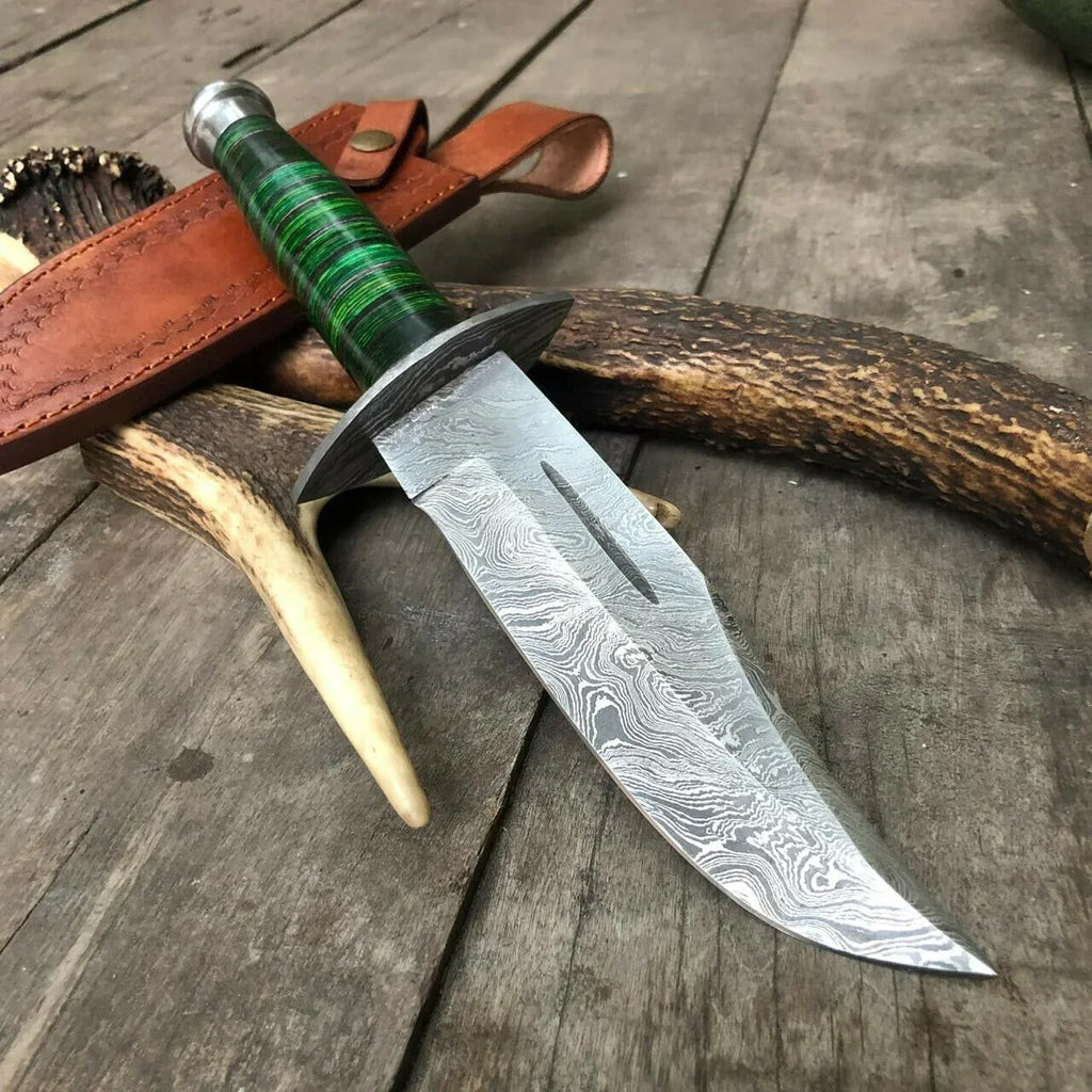 Custom handmade 12-inch Damascus steel Bowie knife with green hardwood handle, Damascus bolster, pommel, and leather sheath.