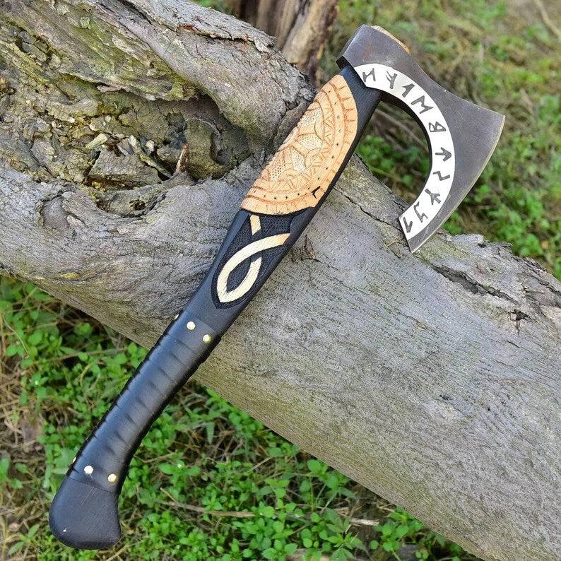 Custom forged handmade carbon steel Viking axe with wood handle and leather sheath, ideal for woodworking or outdoor use.