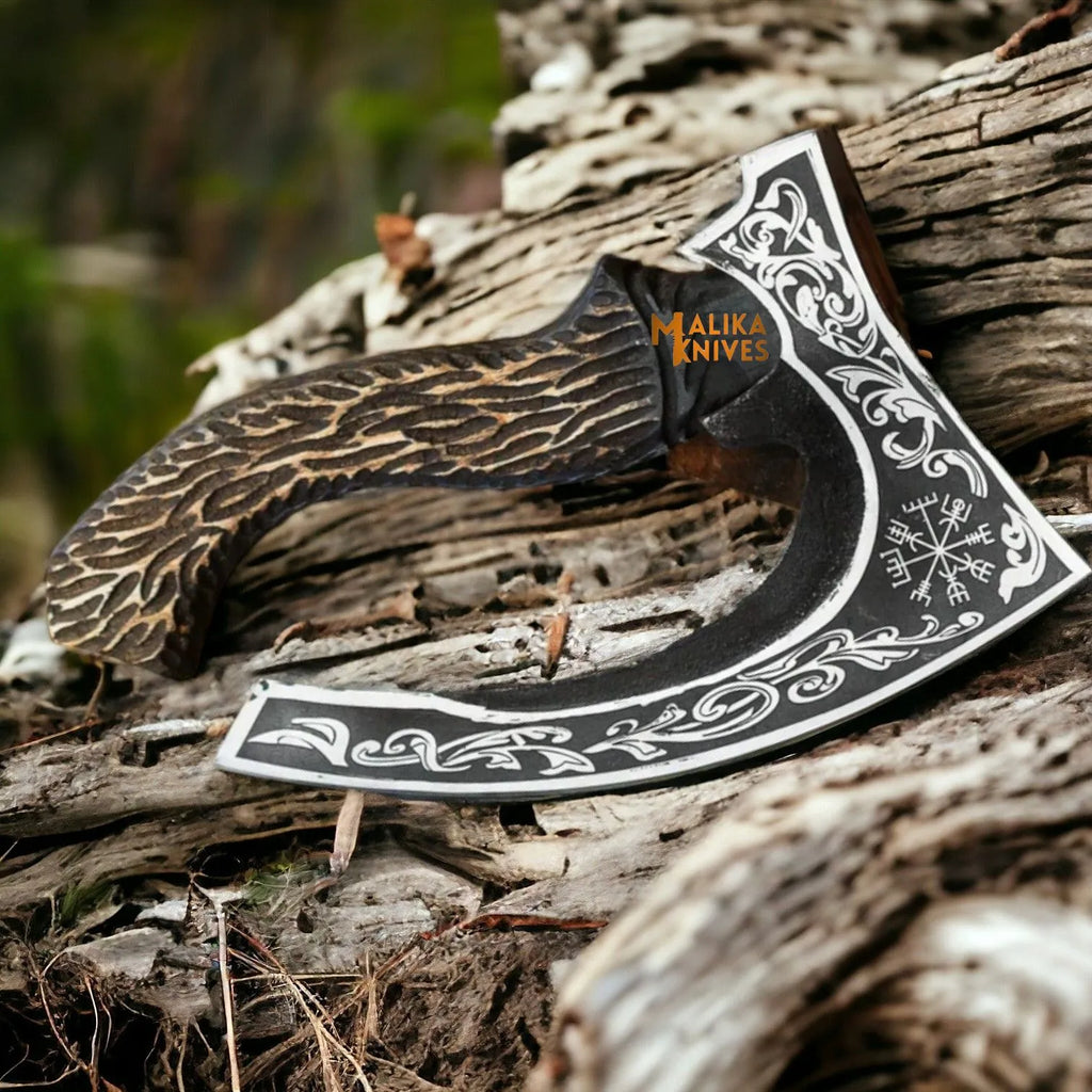 Hand-forged Viking pizza cutter axe by MALIKA KNIVES with leather sheath, featuring a detailed Vegvisir design on the blade.