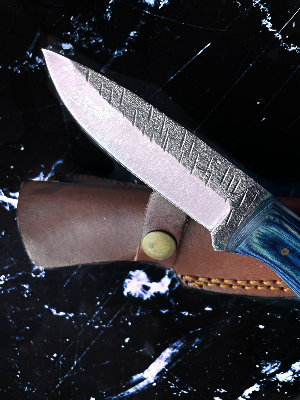 Titan Azura hunting knife with blue diamond wood handle, carbon steel blade, ideal for skinning, camping, and utility tasks.