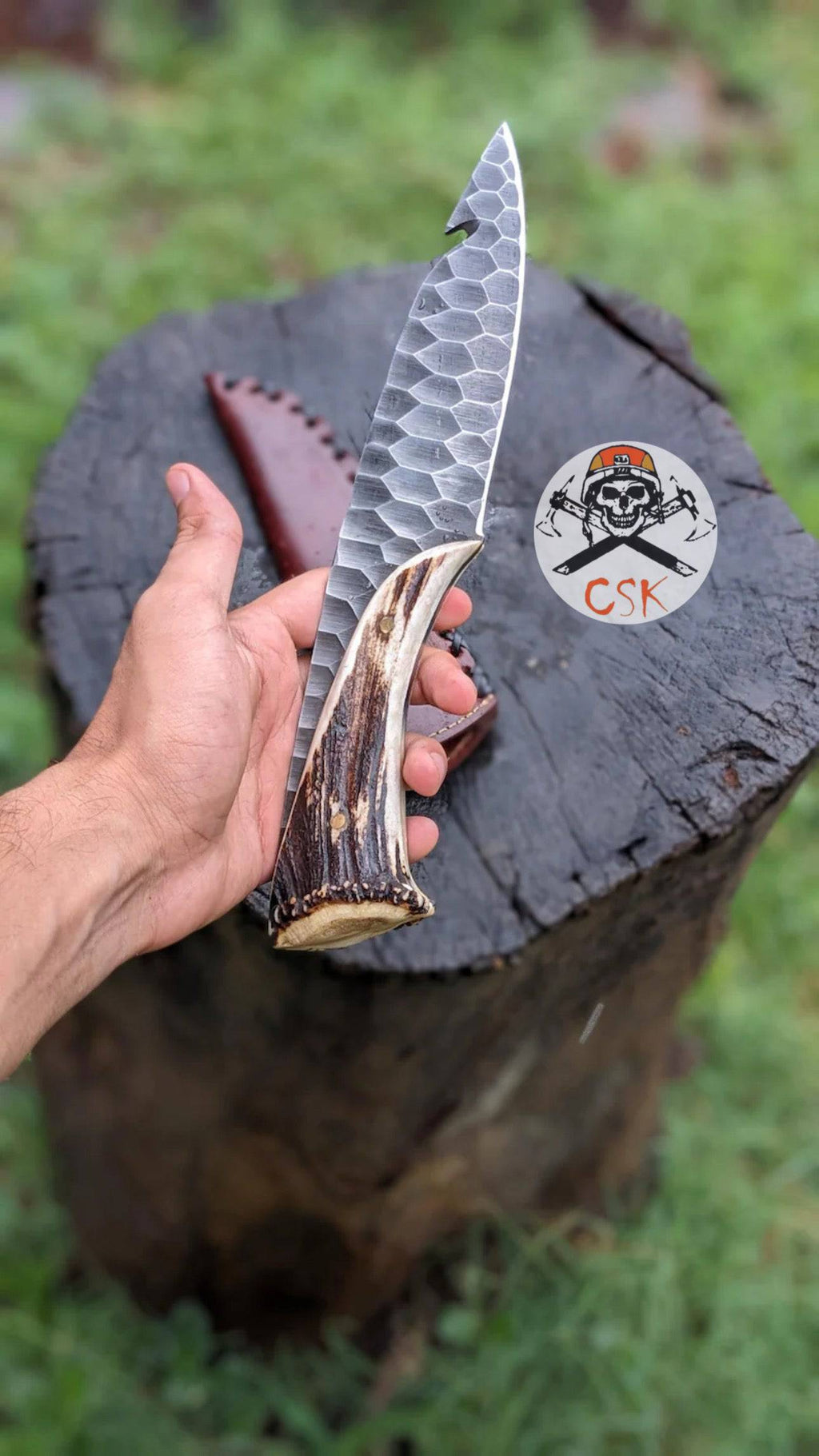 Stone texture hand-forged 1095 steel Viking hunting knife by cskforged, featuring a rustic blade and textured handle.
