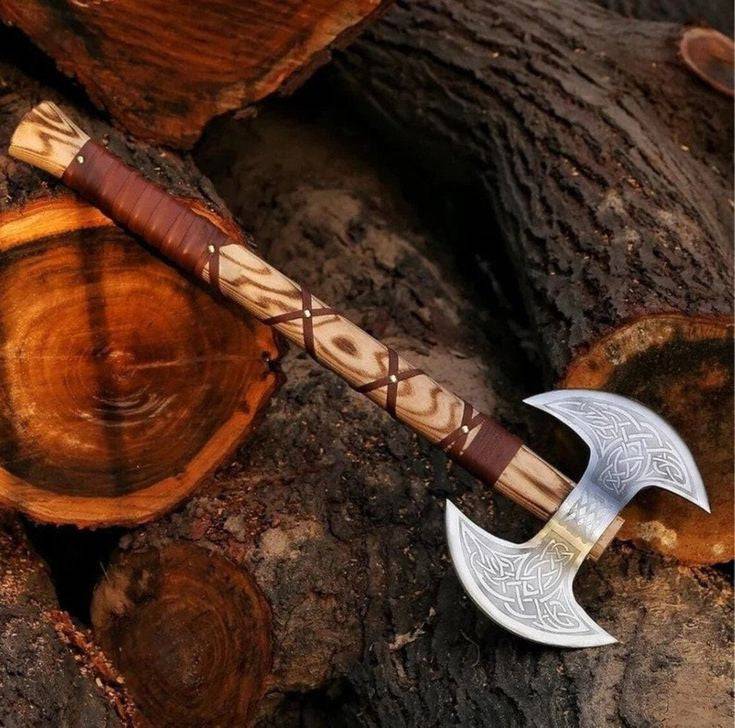 Custom handmade double-blade knife with engraved D2 steel blades and ash wood handle, includes high-quality leather sheath.