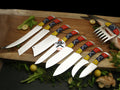 White steel Venezuela chef knife by cskforged, featuring a sharp blade and ergonomic handle for precise culinary prep.
