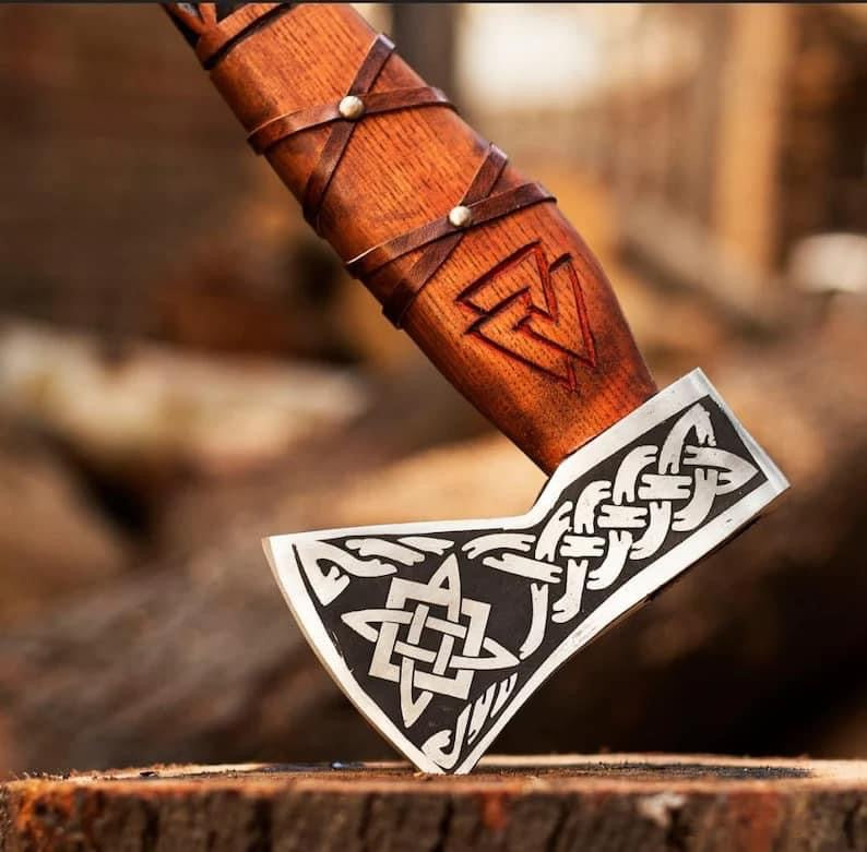 Handmade Viking axe hatchet with hand-forged steel blade and wooden handle, crafted by Knives Gear Garage.