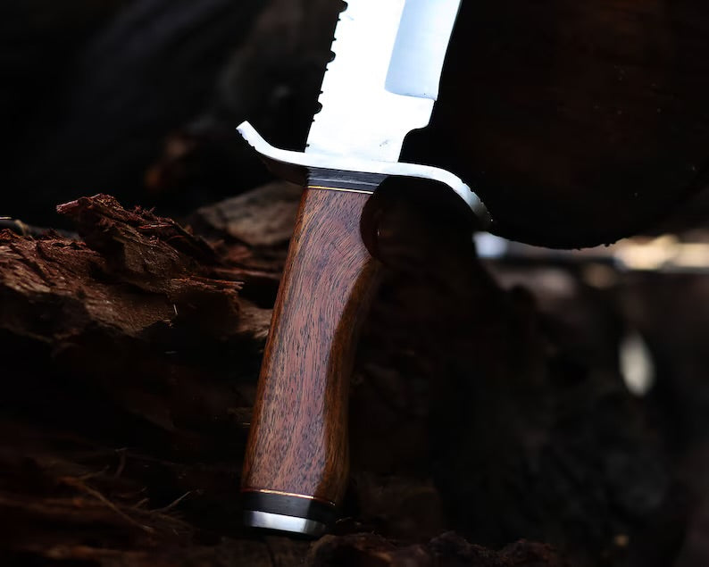 Custom handmade J2 steel Bowie knife with 13-inch bone handle, steel guard, and leather sheath by Knives Gear Garage.
