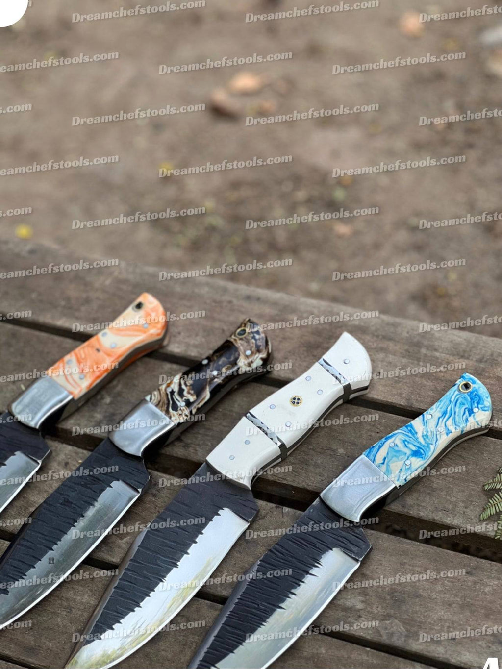 Custom handmade J2 steel hunting knife with leather handle from Knives Gear Garage, featuring a sharp blade and detailed craftsmanship.