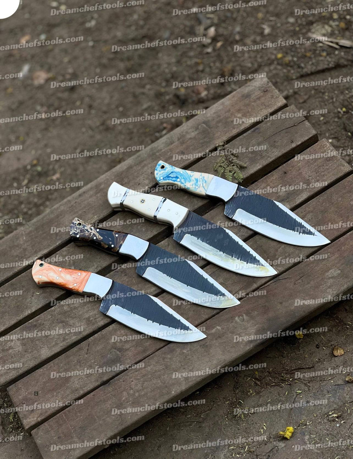 Custom handmade J2 steel hunting knife with a textured handle and sharp blade, crafted by Knives Gear Garage.