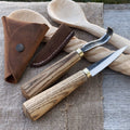 Sharky Forged Steel Tools 2-piece spoon carving knife set with leather sheaths, featuring ergonomic handles and precision blades.