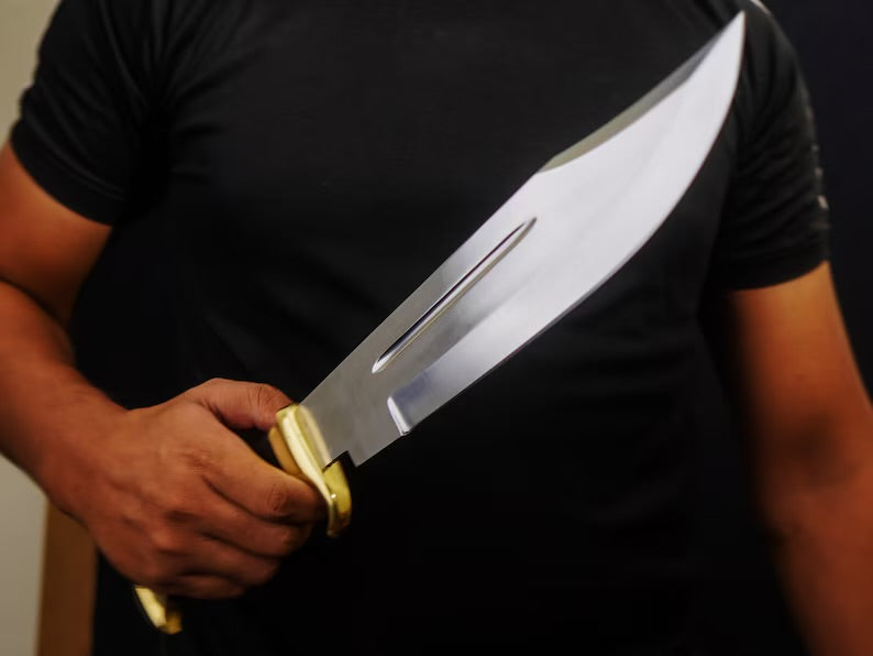 Premium Knives Gear Garage Crocodile Dundee Bowie Knife, 16-inch with brass guard, buffalo horn handle, leather sheath.