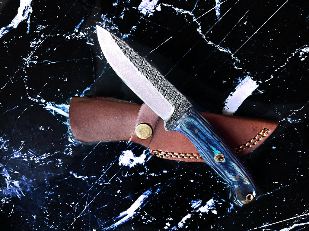 Titan Azura custom hunting knife with blue diamond wood handle, carbon steel blade for skinning, camping, and utility use.