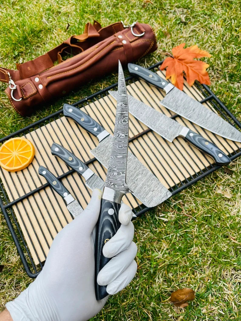 Luxury Knives Gear Garage Damascus steel 5-piece kitchen knife set with G10 handles and steel bolsters in a leather roll kit