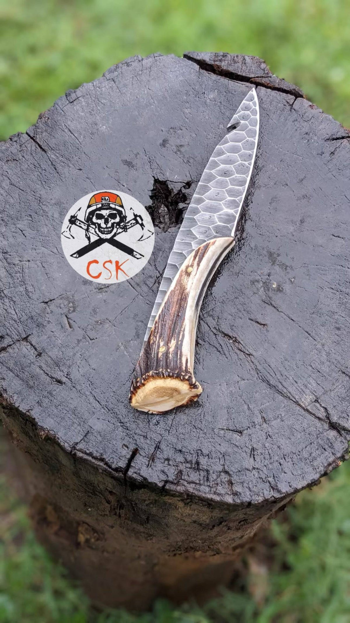 Hand-forged 1095 steel Viking hunting knife with custom stone texture by cskforged, featuring a vintage design and detailed blade.