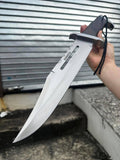 Close-up of the cskforged Rambo Knife with D2 steel blade, featuring a textured handle and rugged design.