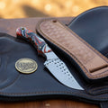 Orange Marble Resin Cowboy Belt Knife with Rasp-Style Blade