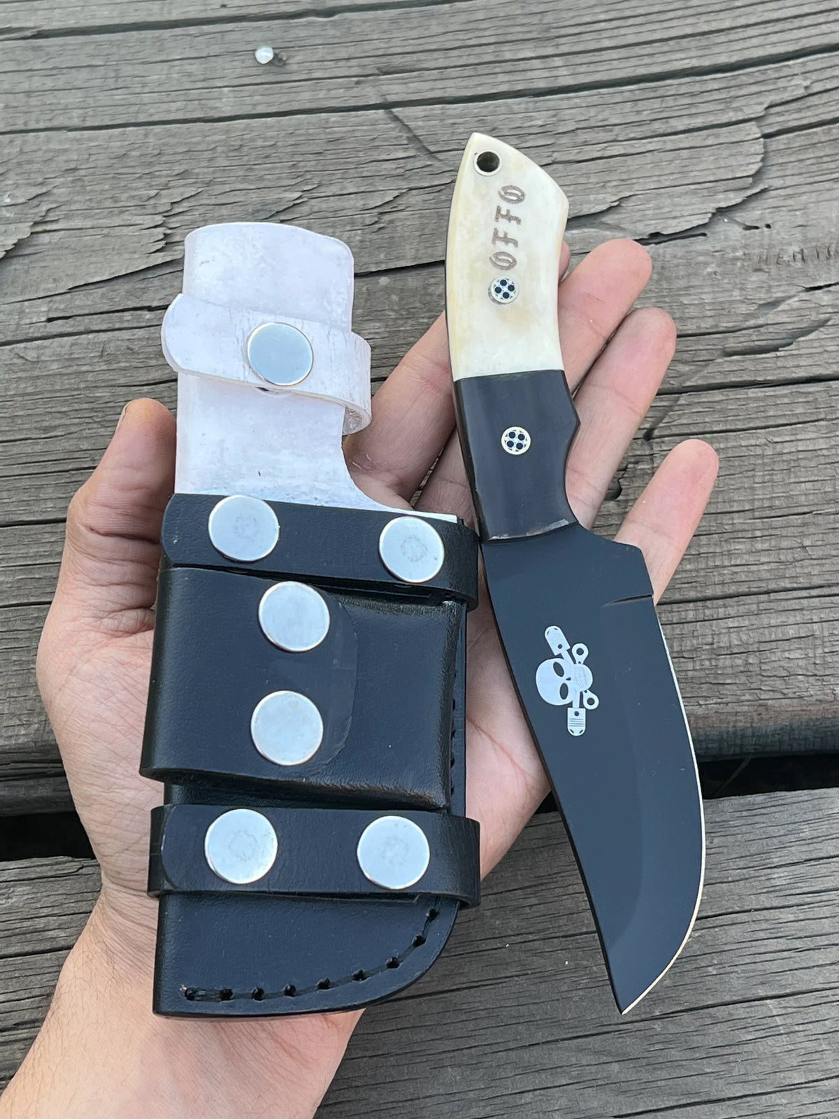 Full tang custom handmade hunting knife with black coated J2 steel blade by Knives Gear Garage, showcasing the detailed blade and handle.