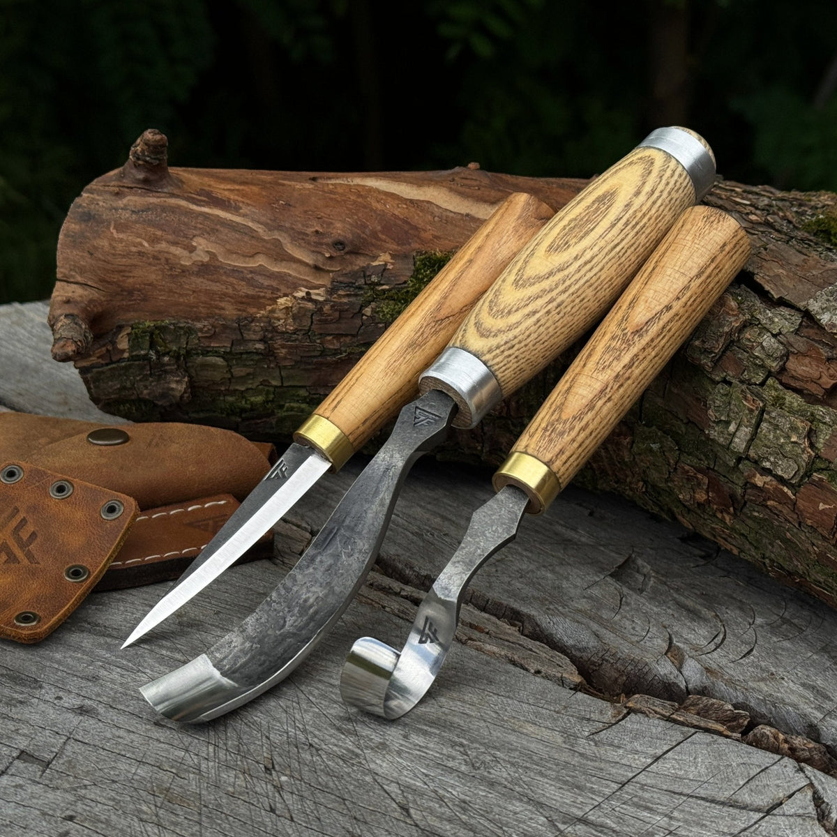 Three-piece spoon carving tool set by Sharky Forged Steel Tools, featuring precision carving tools for woodwork.