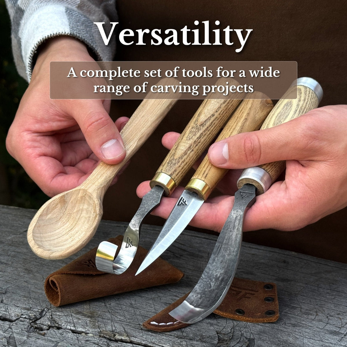 Three-piece Sharky Forged Steel Tools spoon carving set with wooden handles, including carving knives and tools on a work surface.