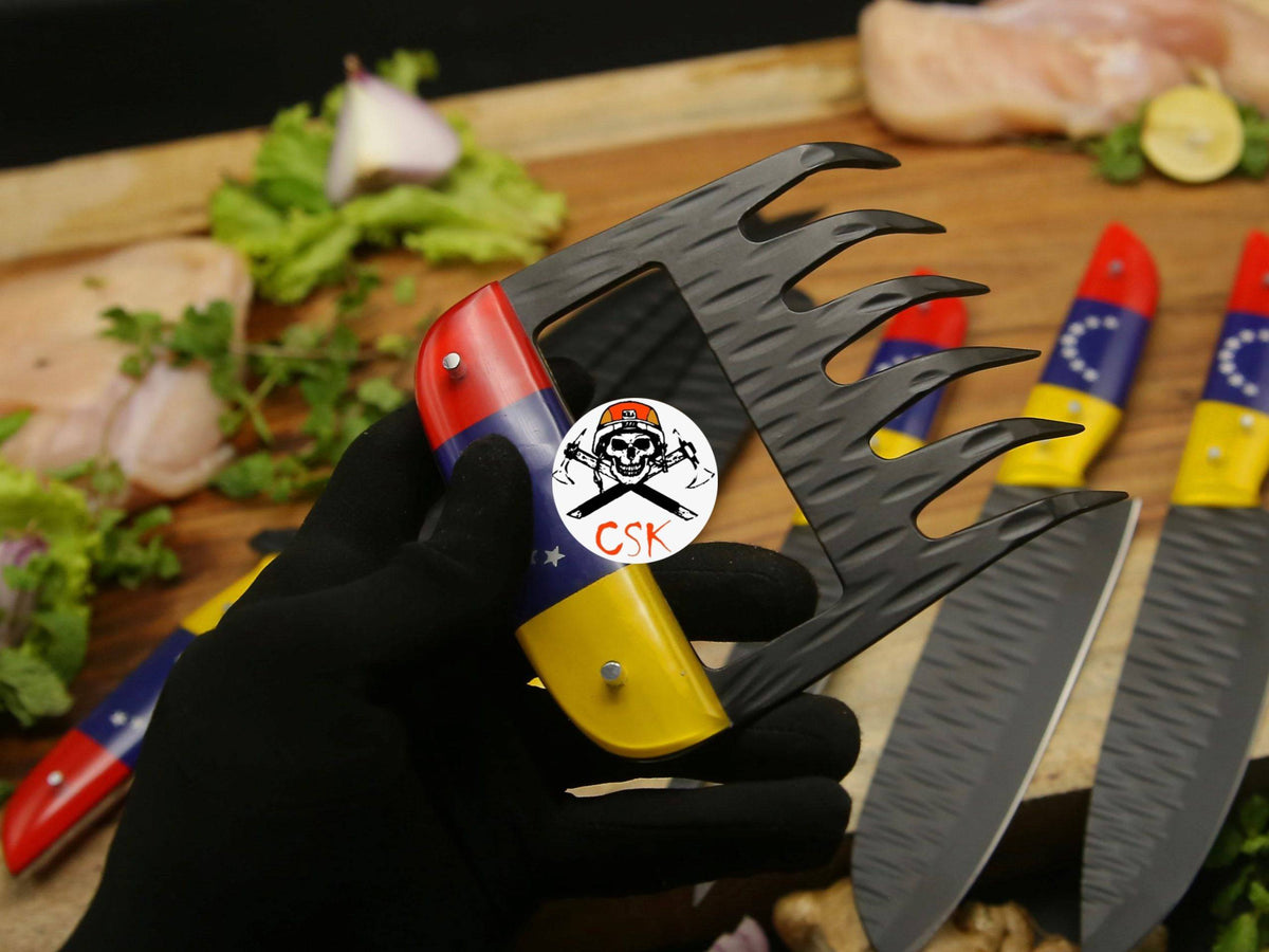 Black stainless steel chef knife by cskforged, featuring a sharp blade and ergonomic handle for precise kitchen cutting tasks.