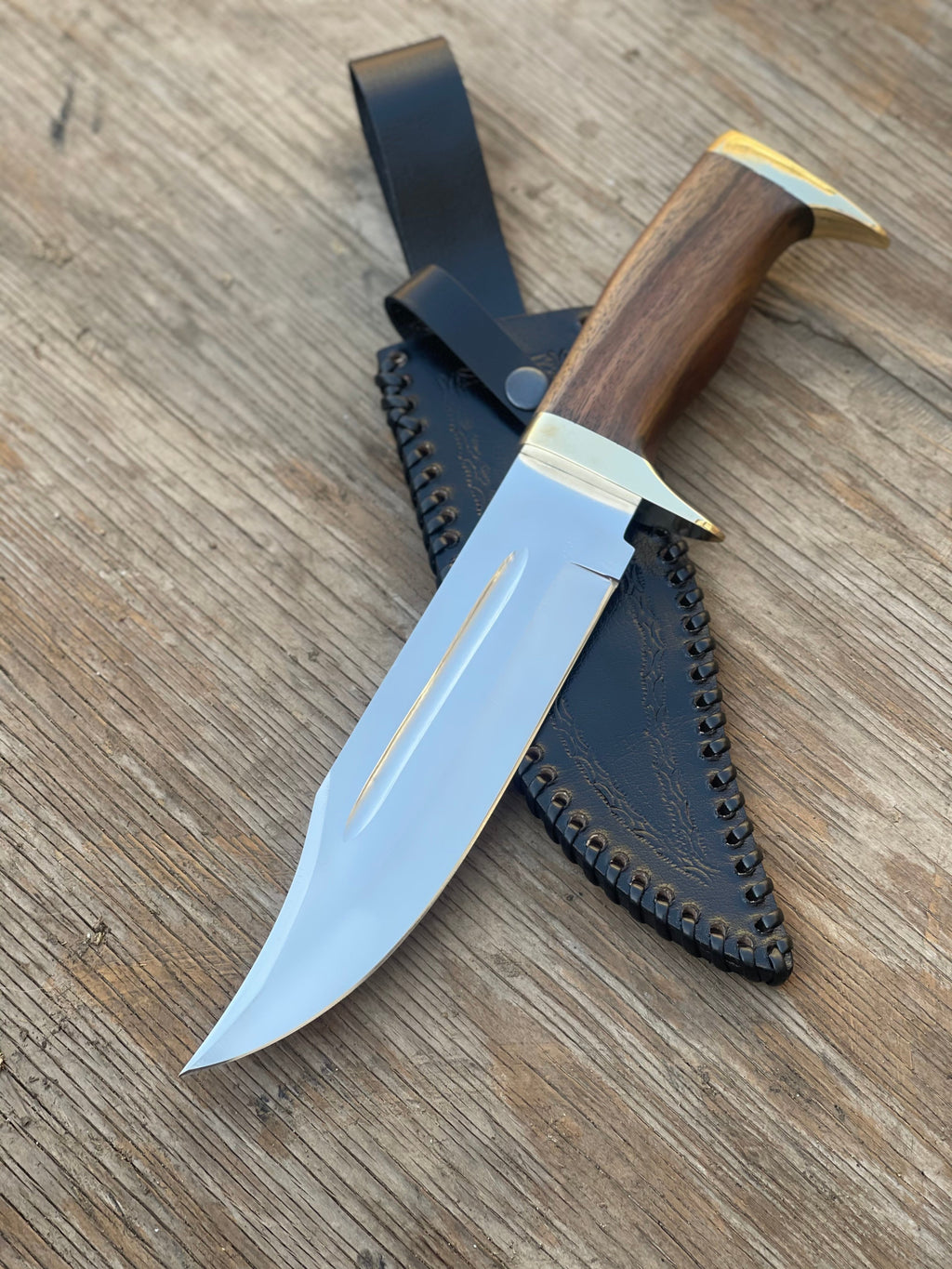 Custom handmade J2 steel Bowie knife with brass guard and rosewood handle, 13-inch length, from Knives Gear Garage.