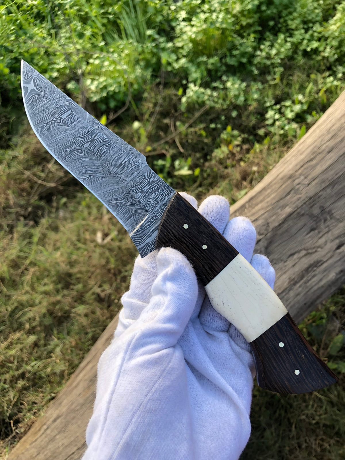 10.5-inch hunting knife with full tang Damascus steel blade and bone-wenge wood handle by Knives Gear Garage.