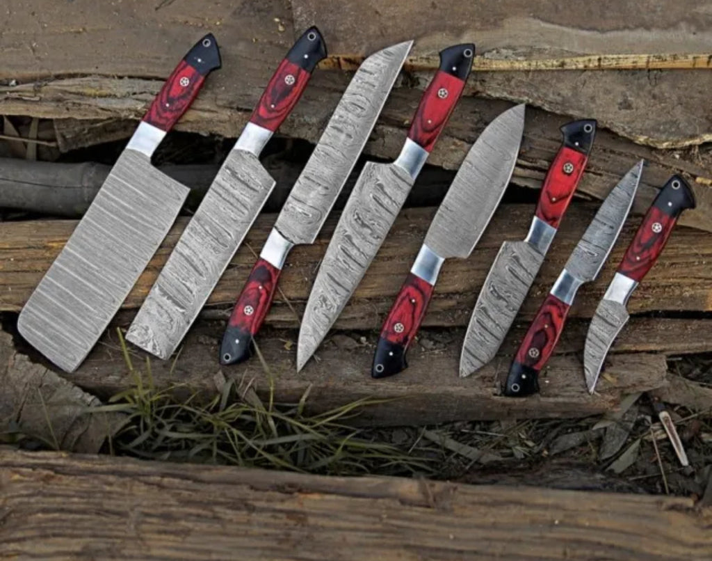 Hand forged Damascus steel BBQ knife set with chef knives from Knives Gear Garage, featuring custom design and sharp blades.