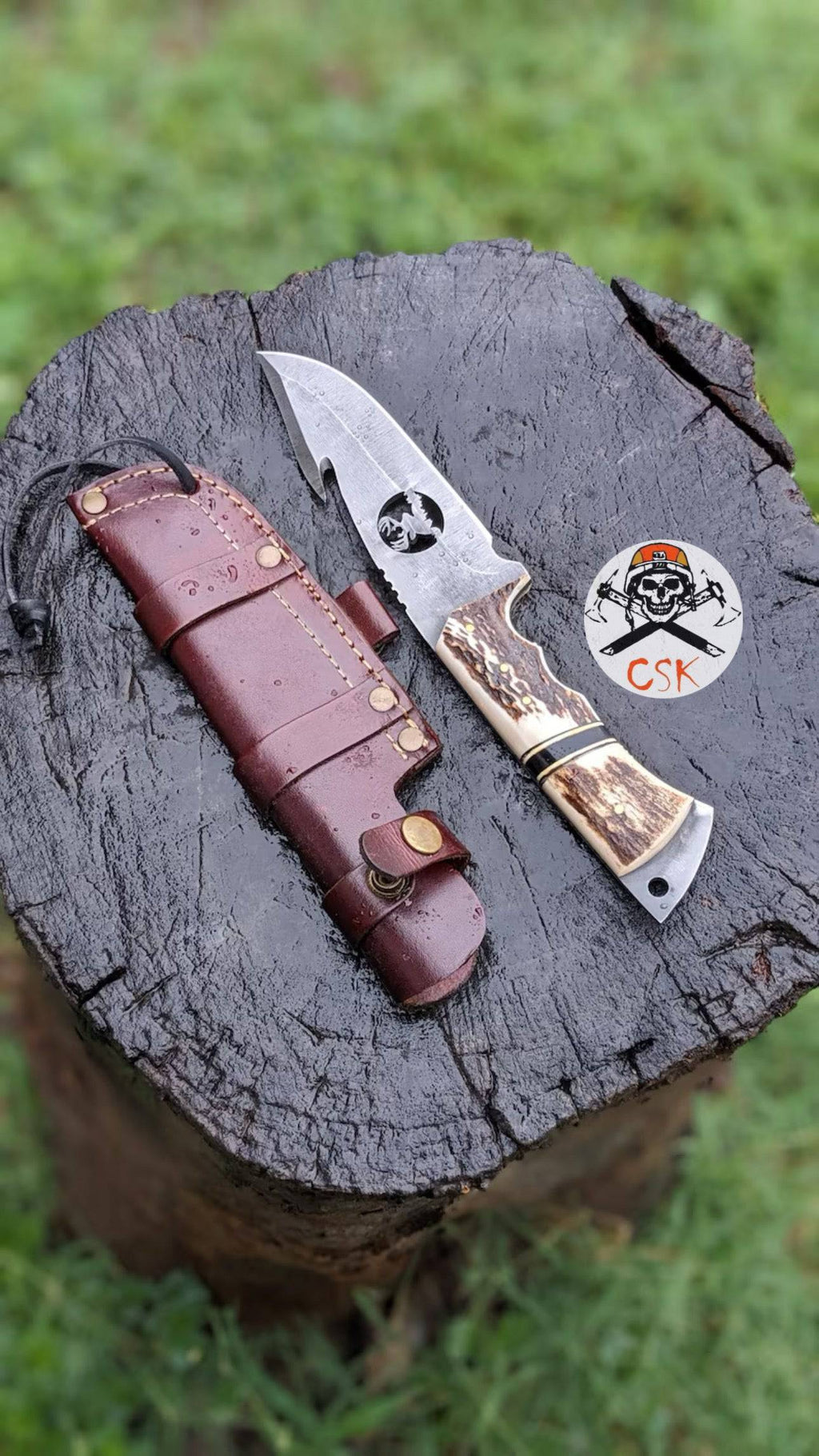Handcrafted cskforged hunting knife with carbon steel blade and antler handle, ideal for bushcraft and survival outdoor activities.