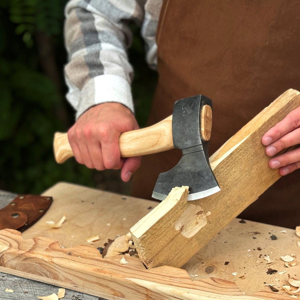 Four-piece spoon carving tool set by Sharky Forged Steel Tools, featuring durable steel carving tools for woodworking projects.