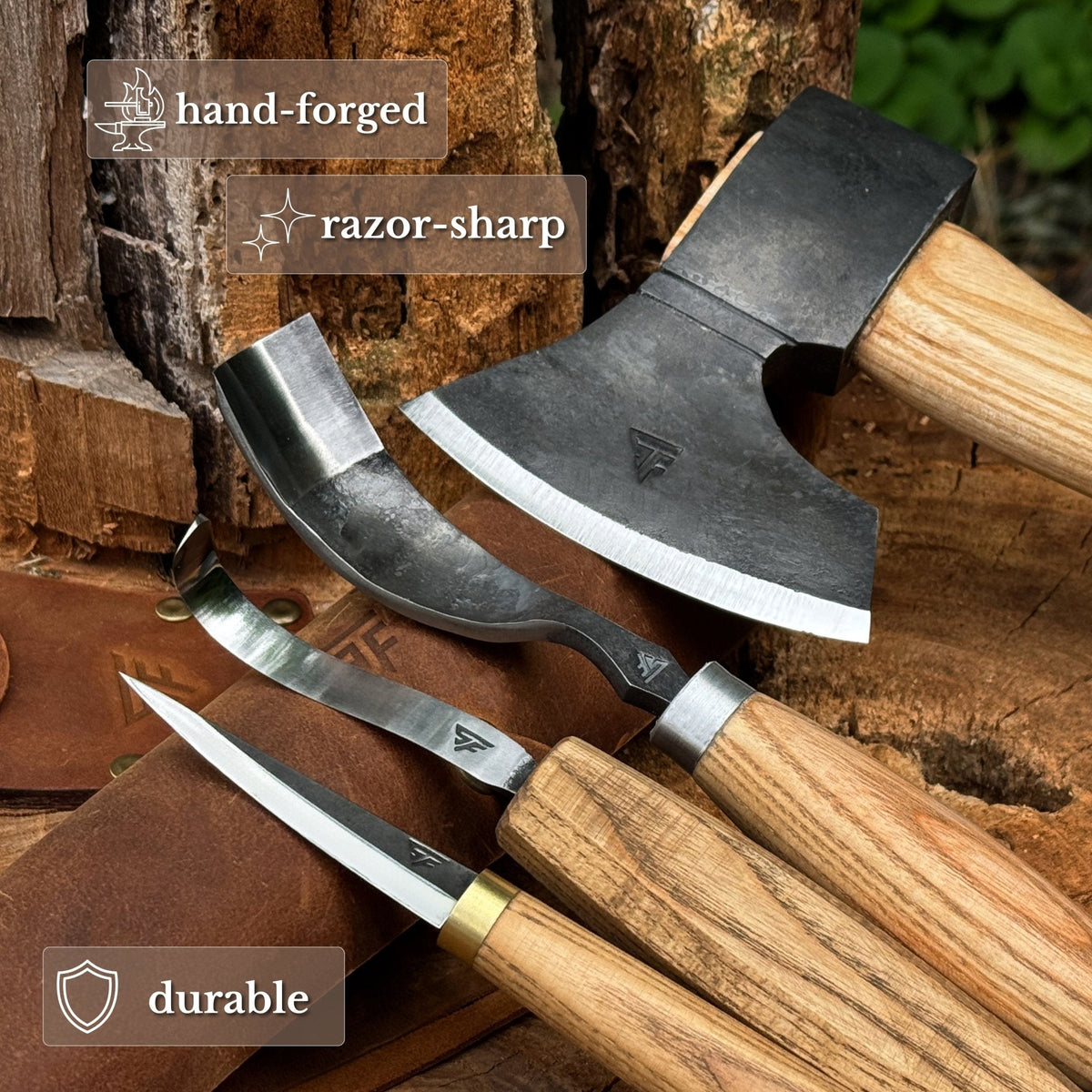 Sharky Forged Steel Tools 4-piece spoon carving tool set with curved and straight carving tools on a wooden surface.