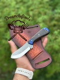 Handmade cowboy knife with rasp tool steel blade, resin handle, and Western leather sheath by Knives Gear Garage.