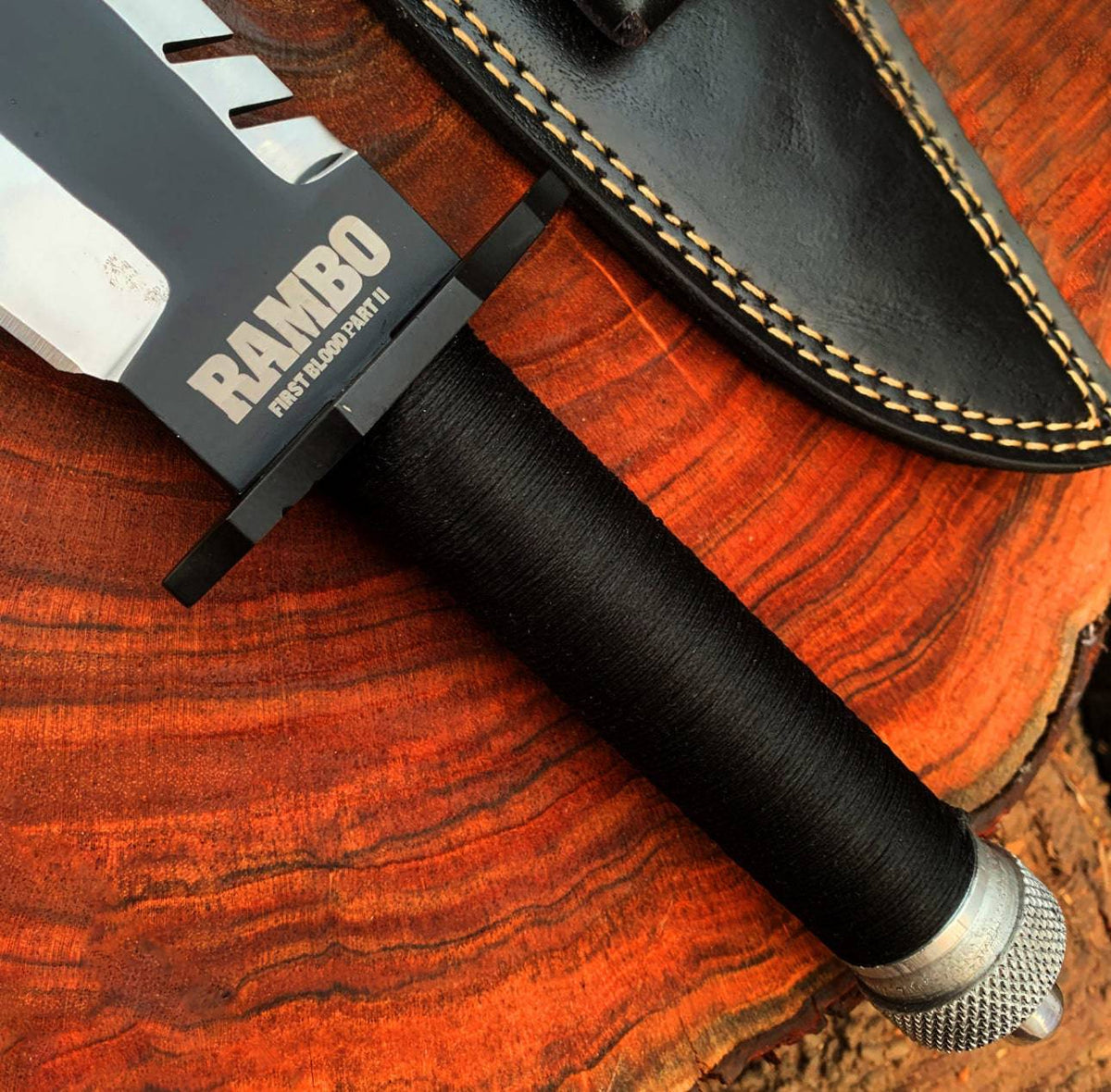 Custom handmade Rambo knife replica from First Blood Part 2 by cskforged, featuring a detailed blade and rugged handle.