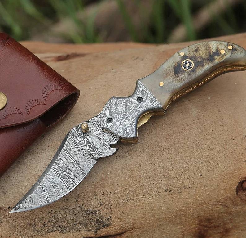 Damascus pocket folding knife with engraved handle and clip, handcrafted EDC knife by Knives Gear Garage, ideal for everyday carry.