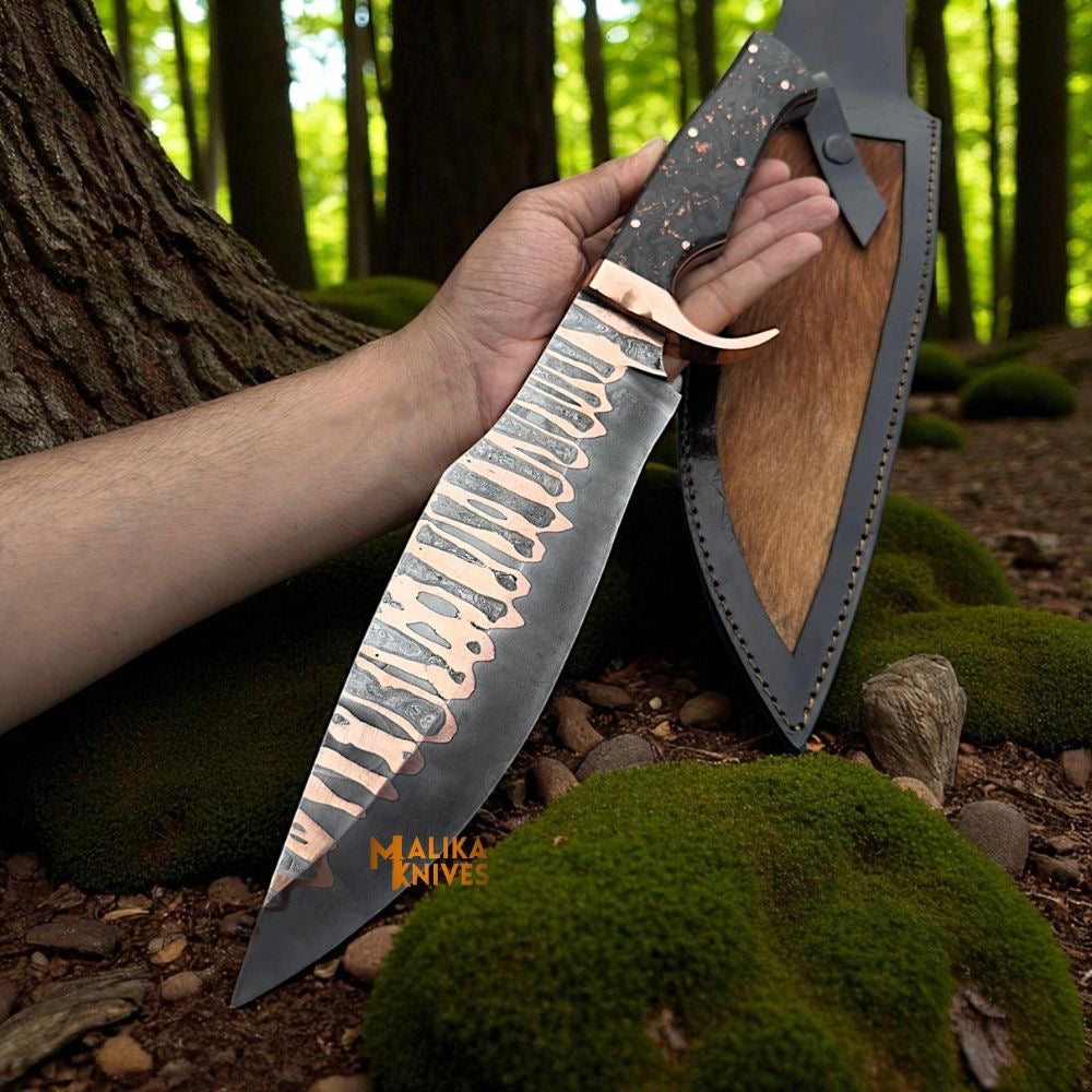 Copper Damascus Bowie knife with carbon fiber handle by Malika Knives, showcasing the detailed patterned blade and sleek handle design.