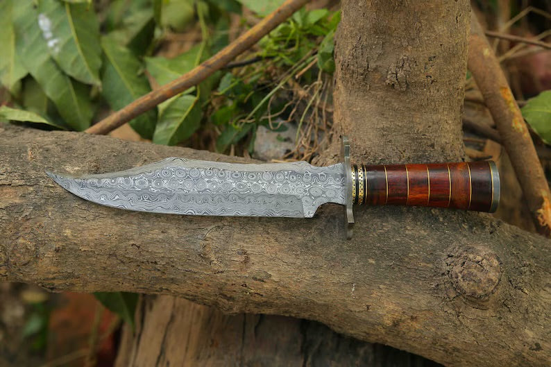 Handcrafted Damascus Steel Bowie Knife with rosewood and brass handle, Damascus steel guard, and leather sheath by Knives Gear Garage