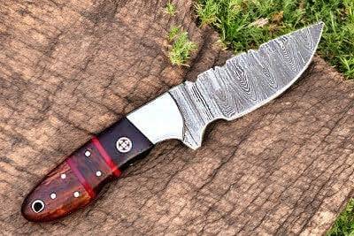Handmade Damascus hunting knife with an 8-inch blade and wood handle, displayed on a neutral background.