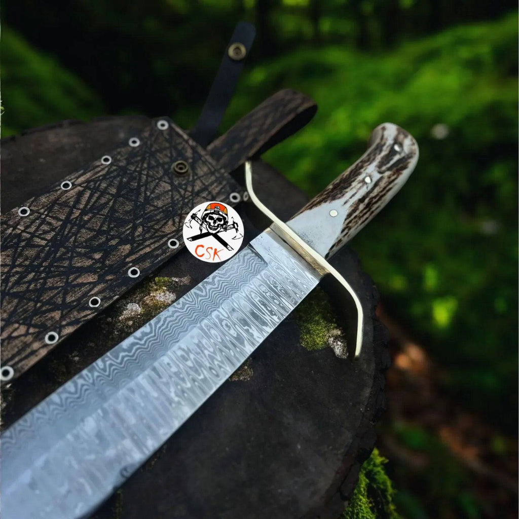 cskforged SS Damascus stag hunting knife with custom leather sheath, featuring a detailed Damascus blade and stag handle.
