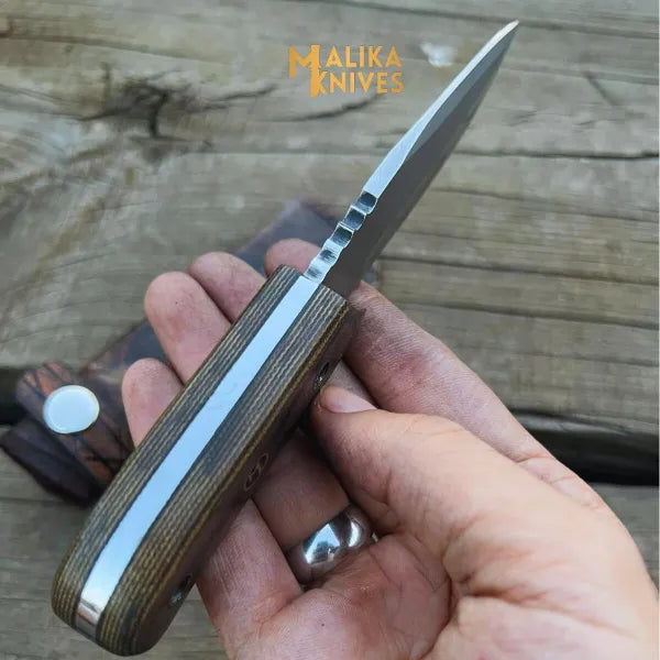Handcrafted MALIKA KNIVES EDC knife with a sleek blade and durable handle, ideal for everyday carry and precision tasks.