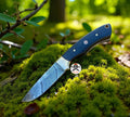 CSKforged outdoor hunting knife with an 8.5-inch Damascus blade and resin handle, ideal for EDC outdoor activities.