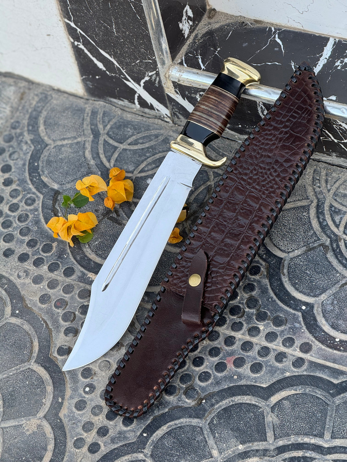 Custom handmade J2 steel crocodile Dundee Bowie knife with brass guard and leather handle, 16-inch length, by Knives Gear Garage.