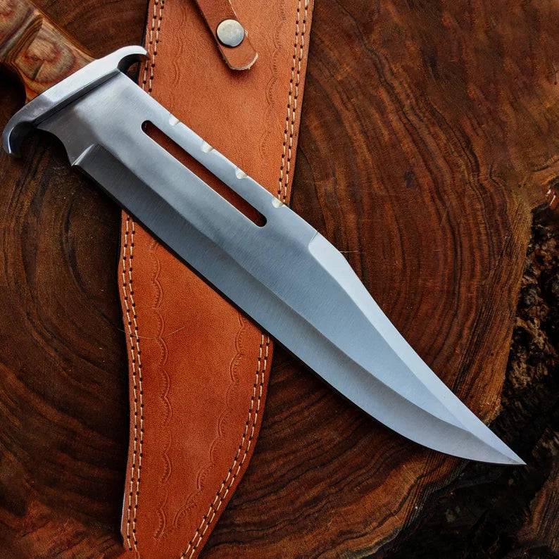Cskforged Rambo survival knife with D2 steel blade, black handle, and rugged design suitable for outdoor survival and camping.